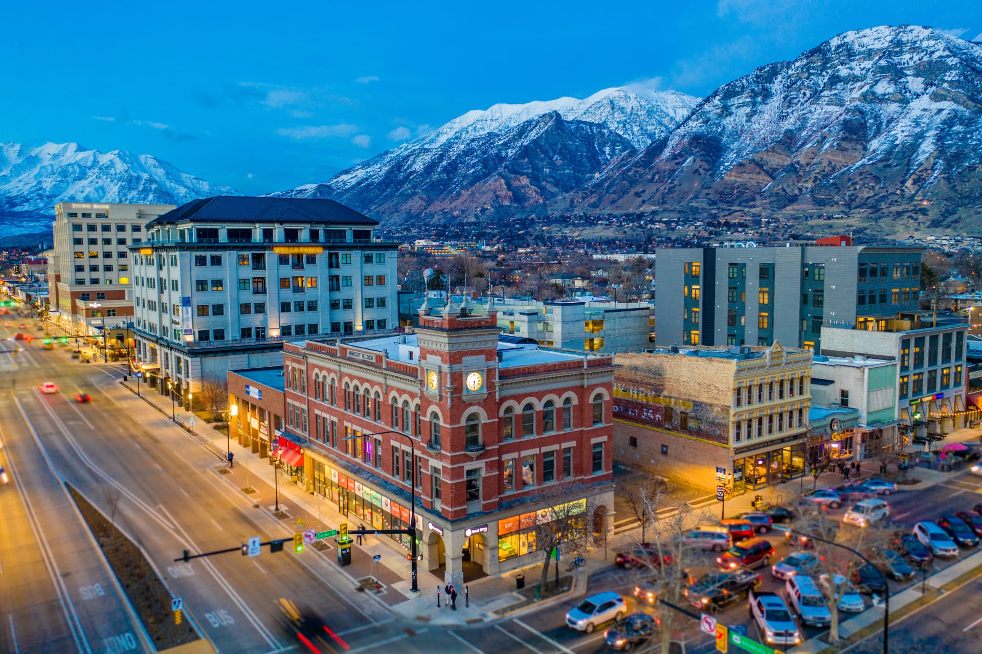 Downtown Orem, Utah at dusk with historic buildings and Mount Timpanogos behind