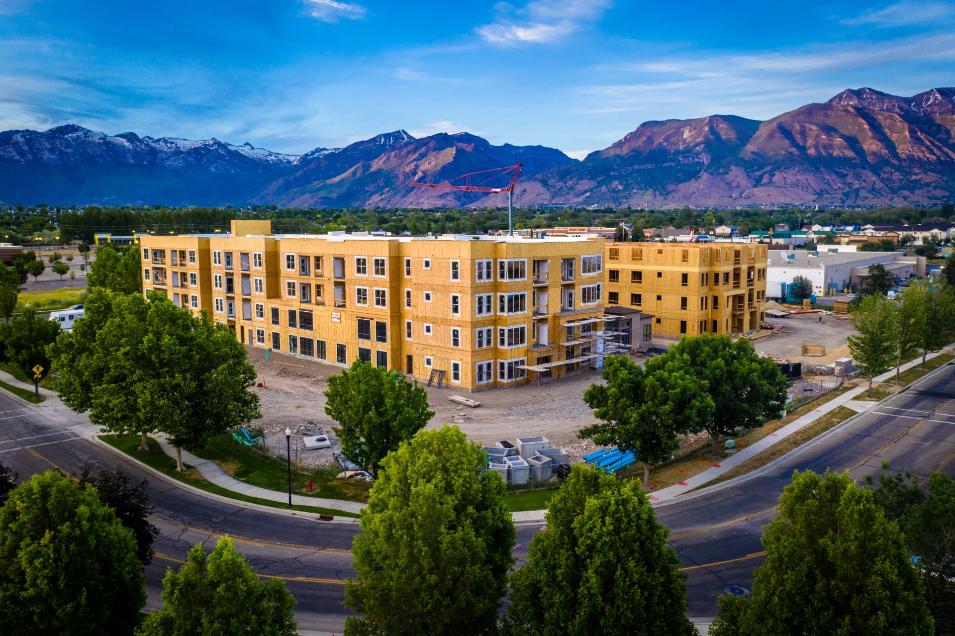 Aerial view of new construction in American Fork, Utah with the Wasatch Range in the background
